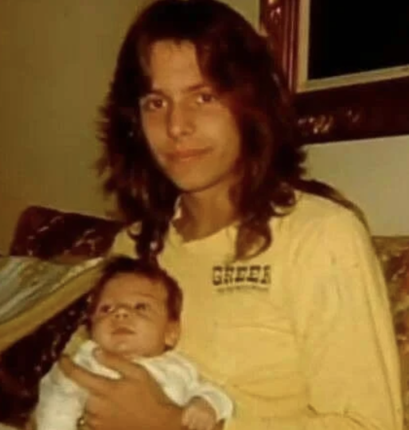 Father Vince Neil holding baby Neil Jason Wharton